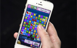 British MP caught playing Candy Crush on iPad in Parliament